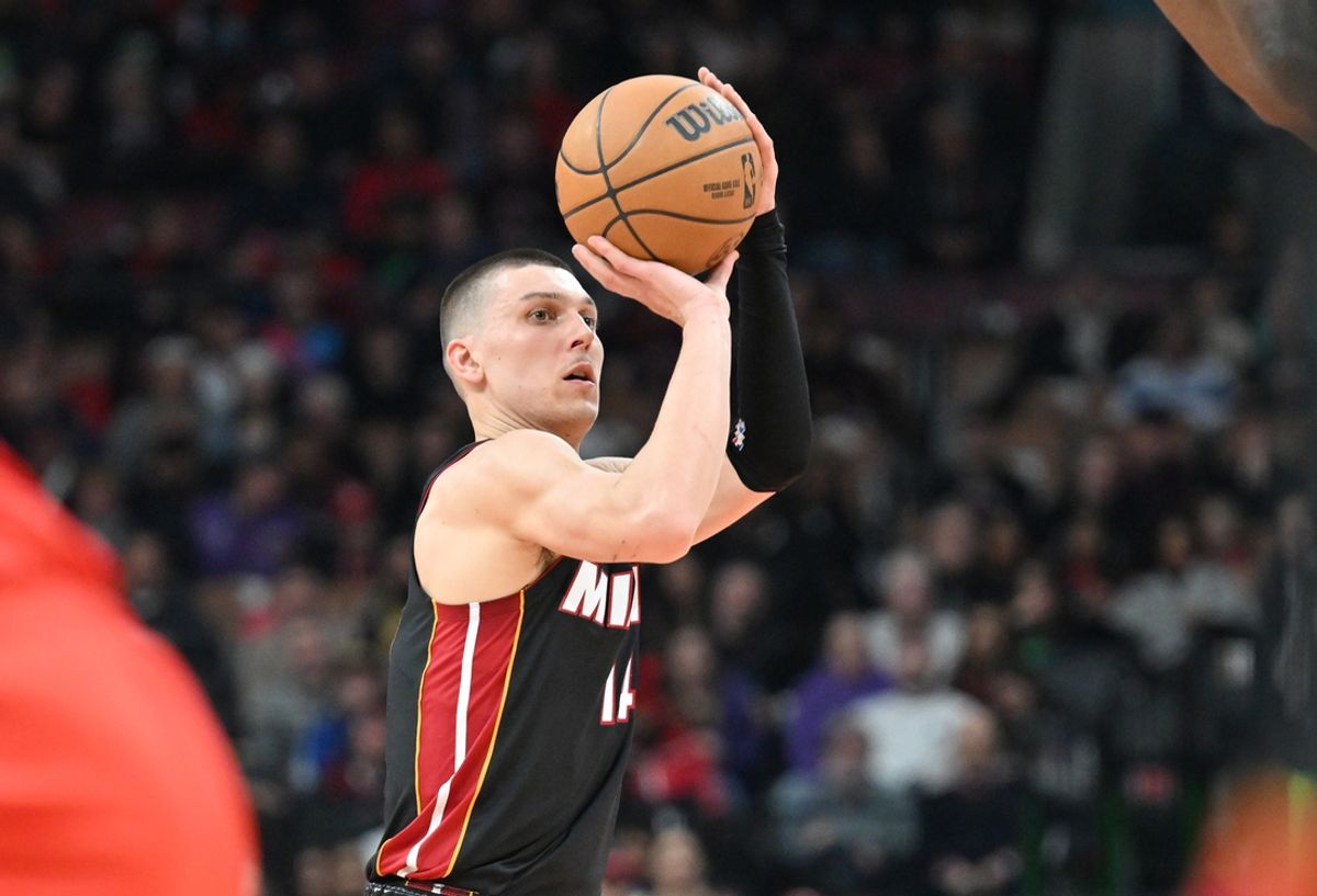 Dec 1, 2024; Toronto, Ontario, CAN;  Miami Heat guard Tyler Herro (14) shoots the ball against the Toronto Raptors in the first half at Scotiabank Arena. Mandatory Credit: Dan Hamilton-Imagn Images