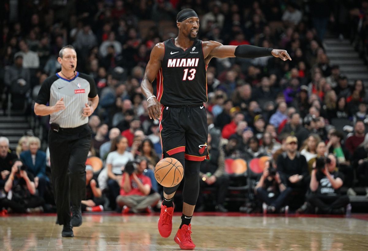 Dec 1, 2024; Toronto, Ontario, CAN;  Miami Heat forward Bam Adebayo (13) controls the offense against the Toronto Raptors in the first half at Scotiabank Arena. Mandatory Credit: Dan Hamilton-Imagn Images