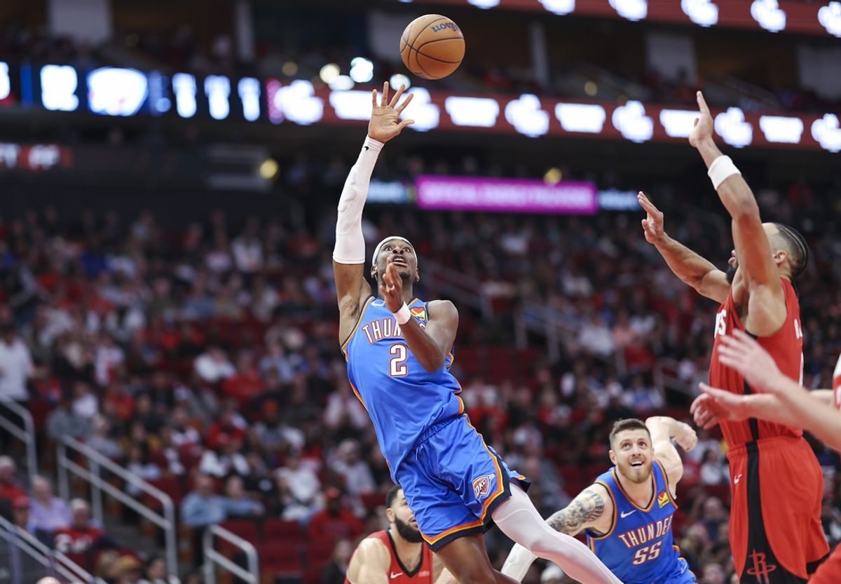 Dec 1, 2024; Houston, Texas, USA; Oklahoma City Thunder guard Shai Gilgeous-Alexander (2) shoots the ball during the second quarter against the Houston Rockets at Toyota Center. Mandatory Credit: Troy Taormina-Imagn Images