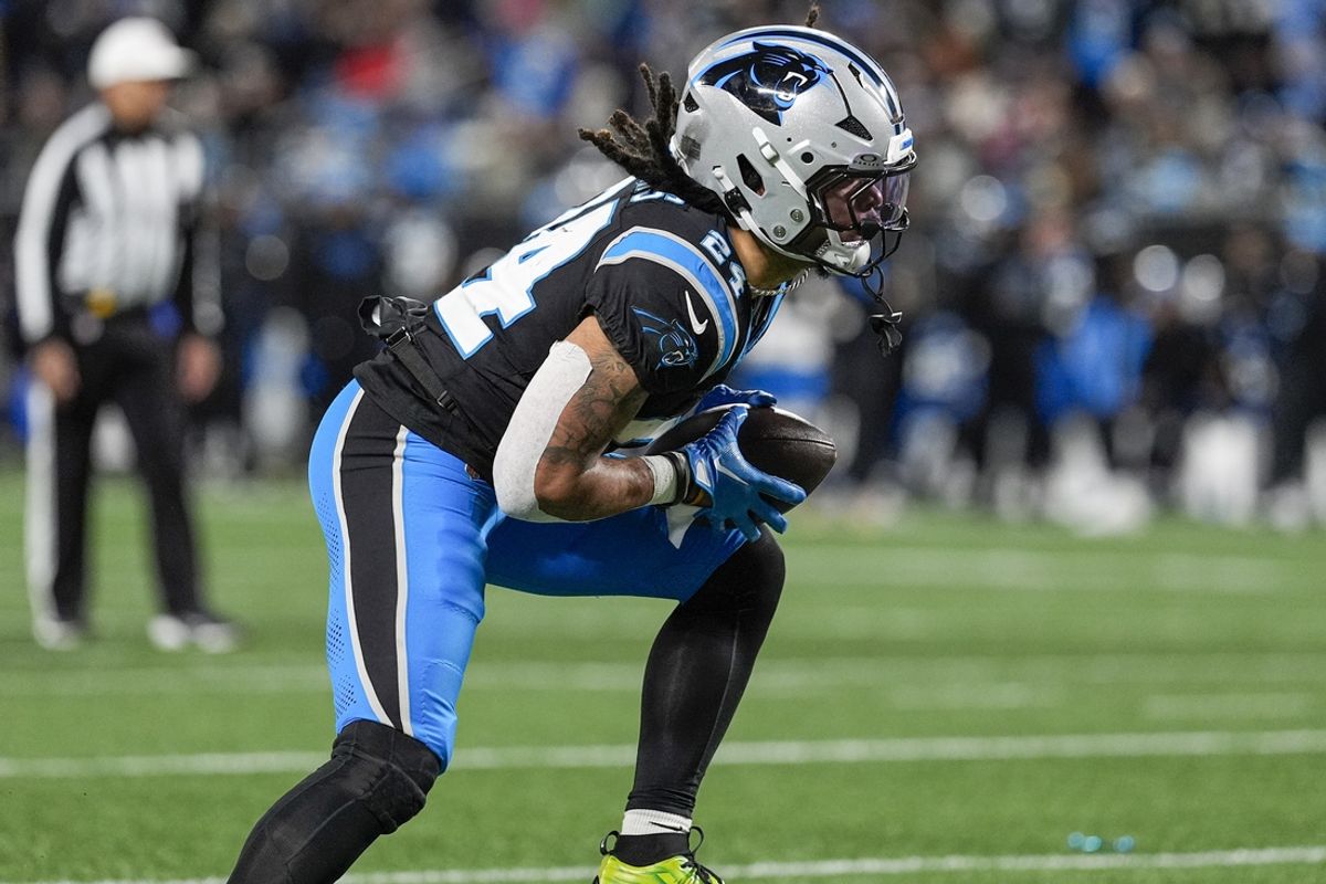 Dec 1, 2024; Charlotte, North Carolina, USA; Carolina Panthers running back Jonathon Brooks (24) runs for yardage against the Tampa Bay Buccaneers during the second half at Bank of America Stadium. Mandatory Credit: Jim Dedmon-Imagn Images