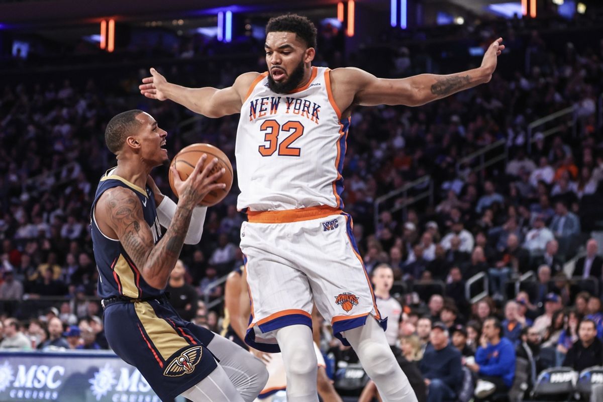 Dec 1, 2024; New York, New York, USA;  New Orleans Pelicans guard Dejounte Murray (5) looks to drive past New York Knicks center Karl-Anthony Towns (32) in the third quarter at Madison Square Garden. Mandatory Credit: Wendell Cruz-Imagn Images