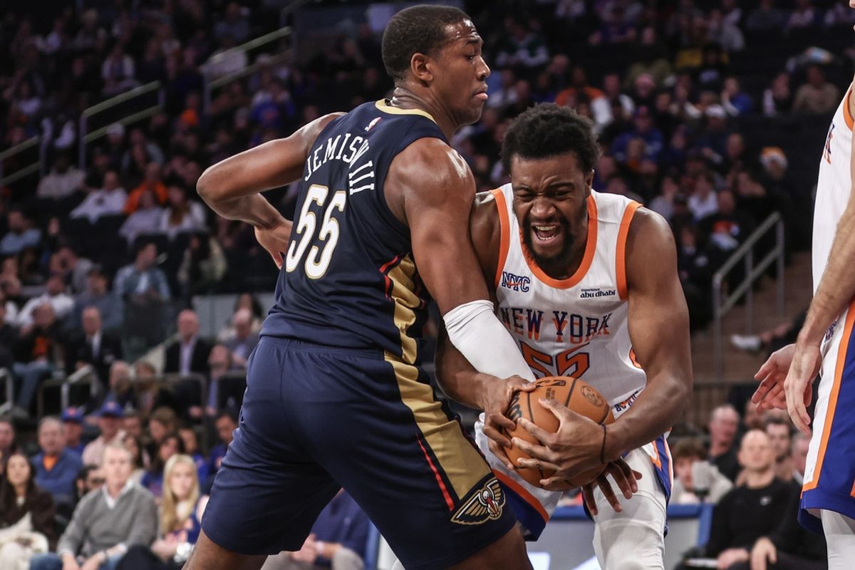 Dec 1, 2024; New York, New York, USA;  New Orleans Pelicans center Trey Jemison III (55) and New York Knicks center Ariel Hukporti (55) fight for a loose ball in the fourth quarter at Madison Square Garden. Mandatory Credit: Wendell Cruz-Imagn Images