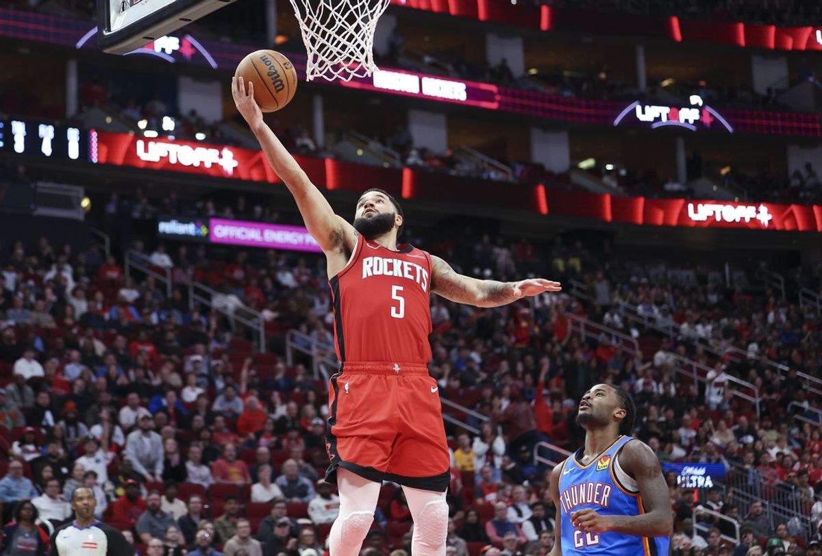 Dec 1, 2024; Houston, Texas, USA; Houston Rockets guard Fred VanVleet (5) makes a basket as Oklahoma City Thunder guard Cason Wallace (22) defends during the fourth quarter at Toyota Center. Mandatory Credit: Troy Taormina-Imagn Images