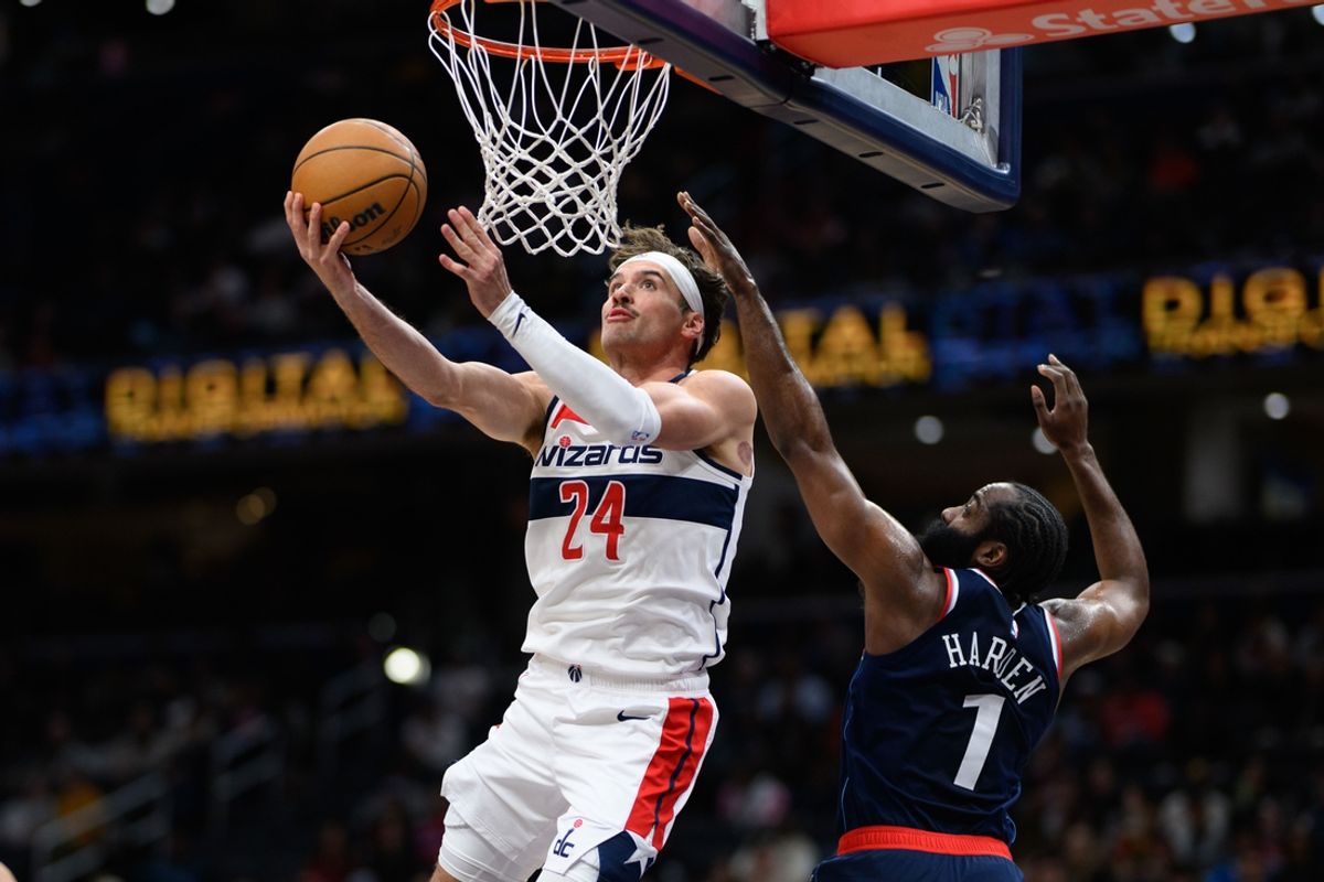 Nov 27, 2024; Washington, District of Columbia, USA; Washington Wizards forward Corey Kispert (24) takes a shot against LA Clippers guard James Harden (1) during the second quarter at Capital One Arena. Mandatory Credit: Reggie Hildred-Imagn Images