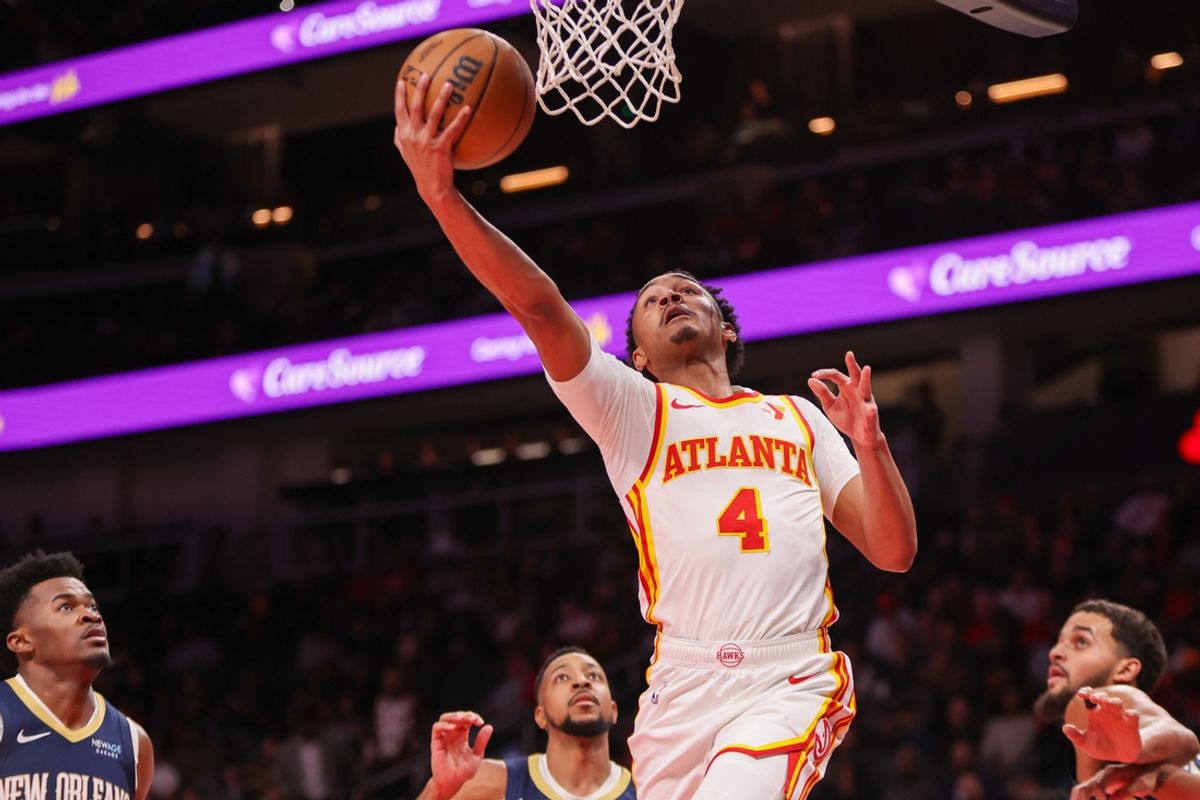 Dec 2, 2024; Atlanta, Georgia, USA; Atlanta Hawks guard Kobe Bufkin (4) shoots against the New Orleans Pelicans in the second quarter at State Farm Arena. Mandatory Credit: Brett Davis-Imagn Images
