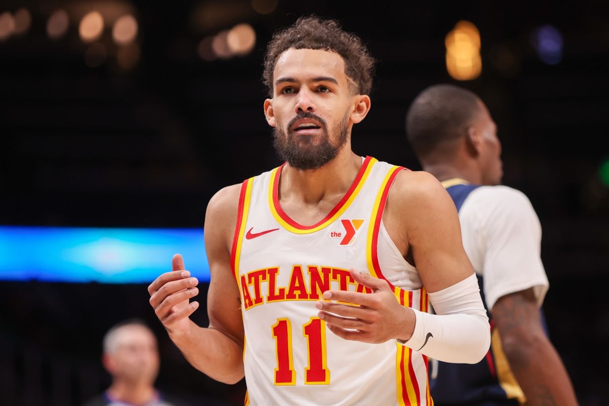 Dec 2, 2024; Atlanta, Georgia, USA; Atlanta Hawks guard Trae Young (11) reacts after a foul call against the New Orleans Pelicans in the fourth quarter at State Farm Arena. Mandatory Credit: Brett Davis-Imagn Images