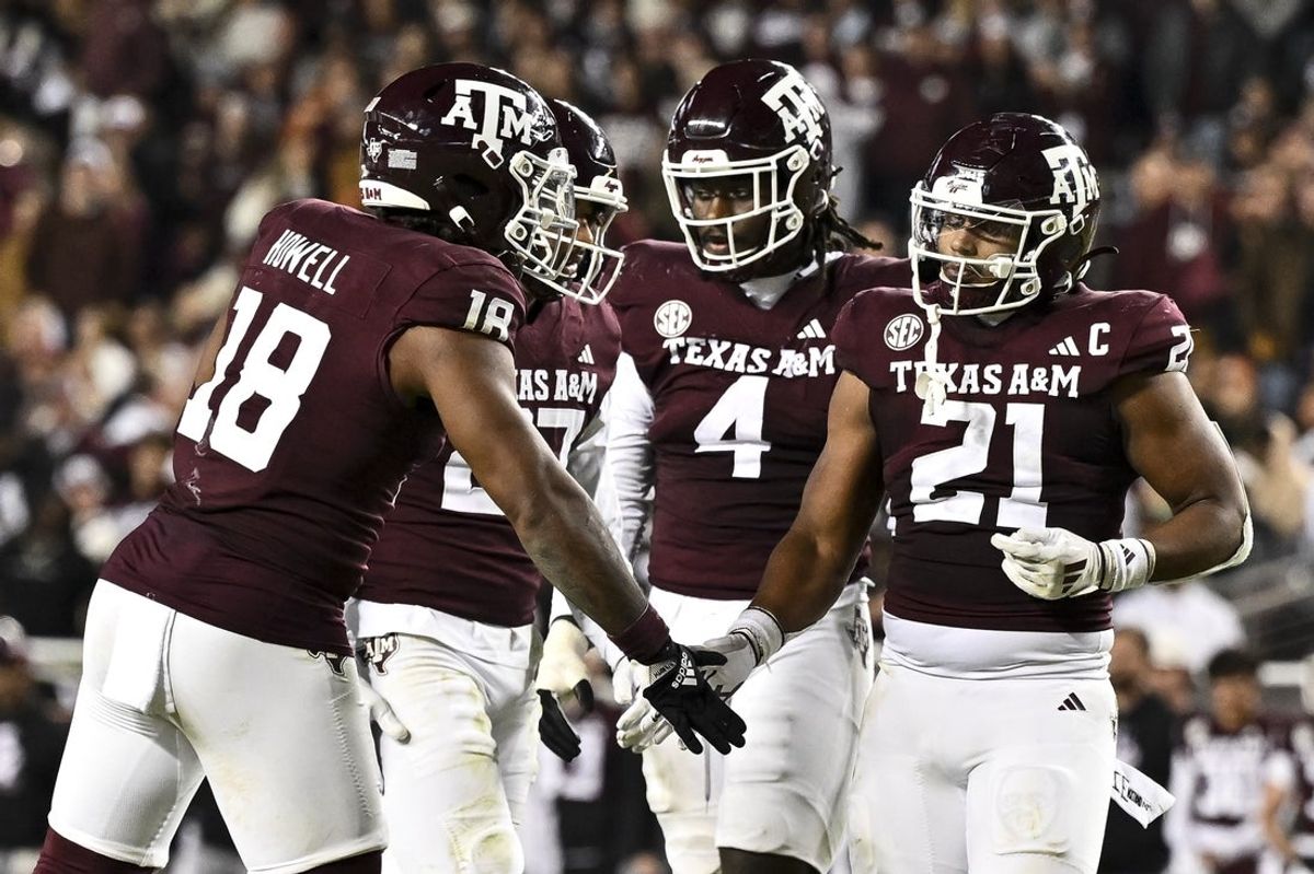Nov 30, 2024; College Station, Texas, USA; Texas A&M Aggies linebacker Taurean York (21) reacts against the Texas Longhorns during the second half. The Longhorns defeated the Aggies 17-7 at Kyle Field. Mandatory Credit: Maria Lysaker-Imagn Images