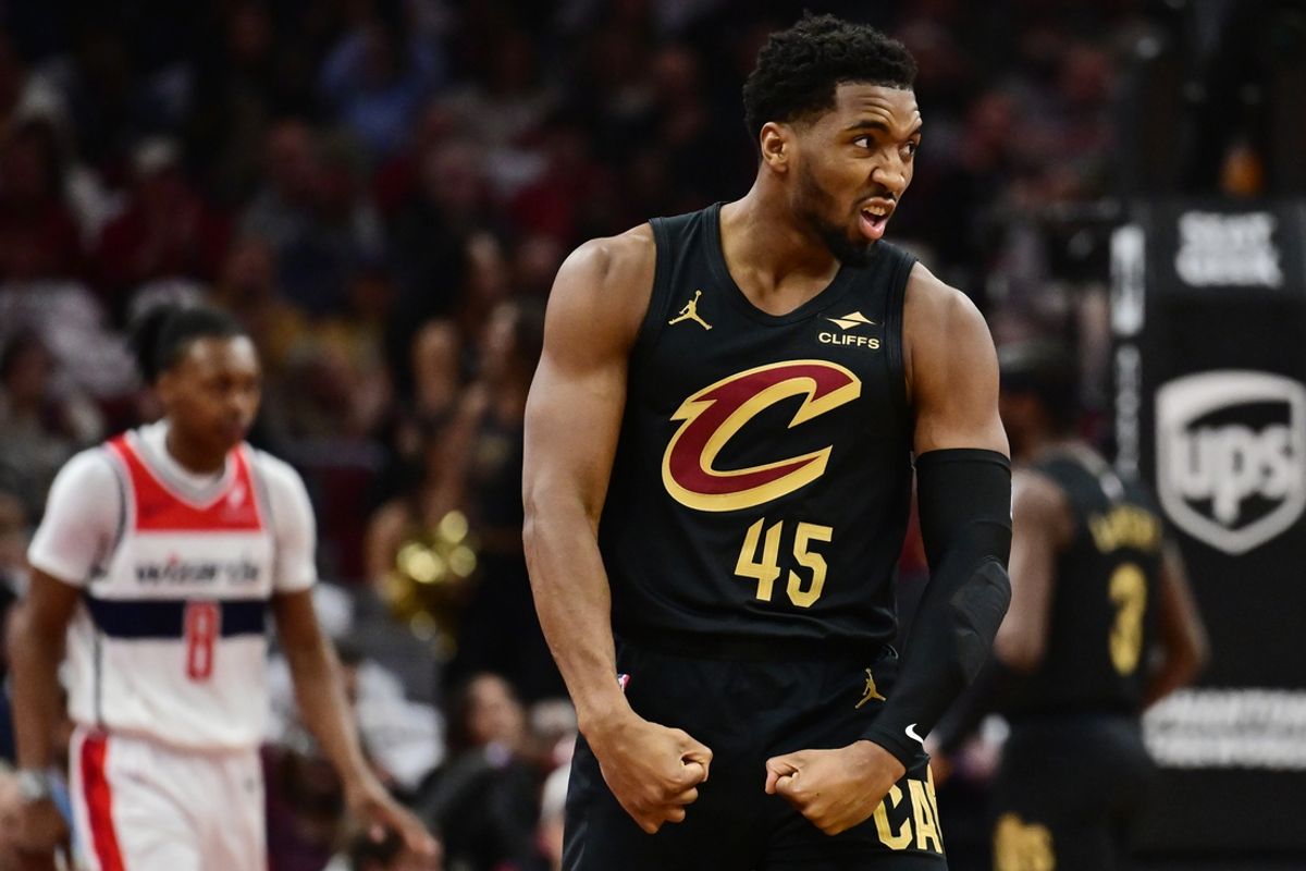 Dec 3, 2024; Cleveland, Ohio, USA; Cleveland Cavaliers guard Donovan Mitchell (45) celebrates after a play during the first half against the Washington Wizards at Rocket Mortgage FieldHouse. Mandatory Credit: Ken Blaze-Imagn Images