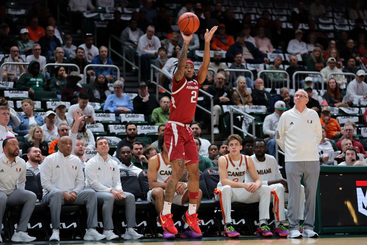 Dec 3, 2024; Coral Gables, Florida, USA; Arkansas Razorbacks guard Boogie Fland (2) shoots the basketball against the Miami Hurricanes during the first half at Watsco Center. Mandatory Credit: Sam Navarro-Imagn Images
