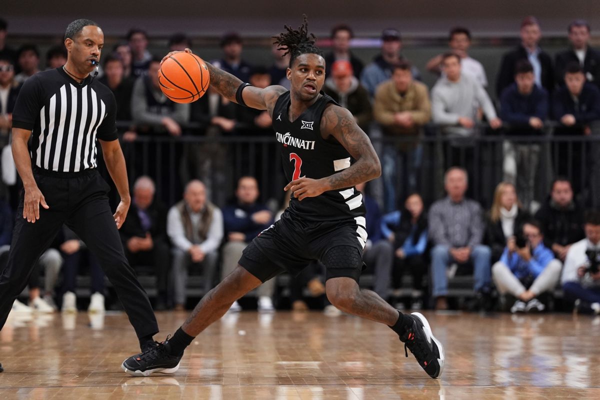 Dec 3, 2024; Villanova, Pennsylvania, USA; Cincinnati Bearcats guard Jizzle James (2) controls the ball against the Villanova Wildcats in the second half at William B. Finneran Pavilion. Mandatory Credit: Kyle Ross-Imagn Images