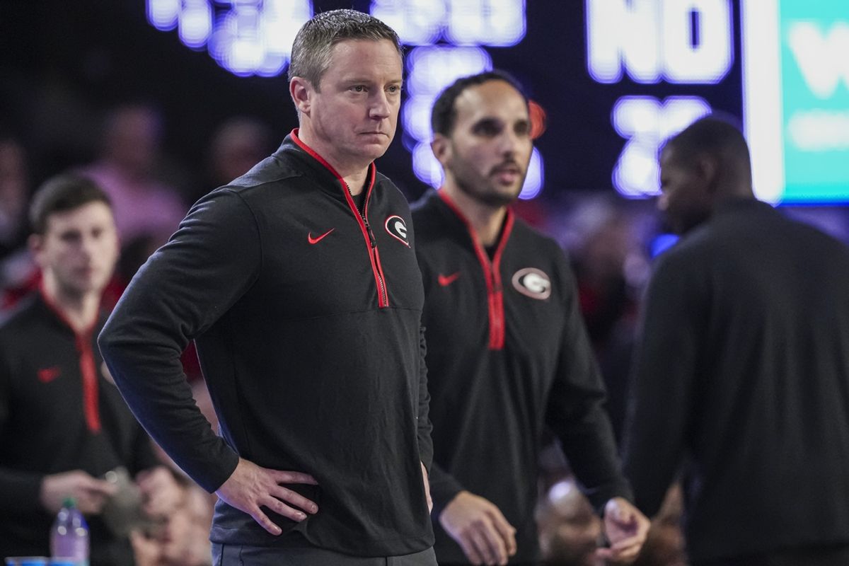 Dec 3, 2024; Athens, Georgia, USA; Georgia Bulldogs head coach Mike White on the bench during the game against the Notre Dame Fighting Irish during the first half at Stegeman Coliseum. Mandatory Credit: Dale Zanine-Imagn Images