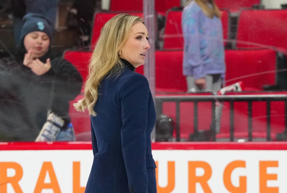 Dec 3, 2024; Raleigh, North Carolina, USA;  Seattle Kraken assistant coach Jessica Campbell walks off the ice after their victory against the Carolina Hurricanes at Lenovo Center. Mandatory Credit: James Guillory-Imagn Images