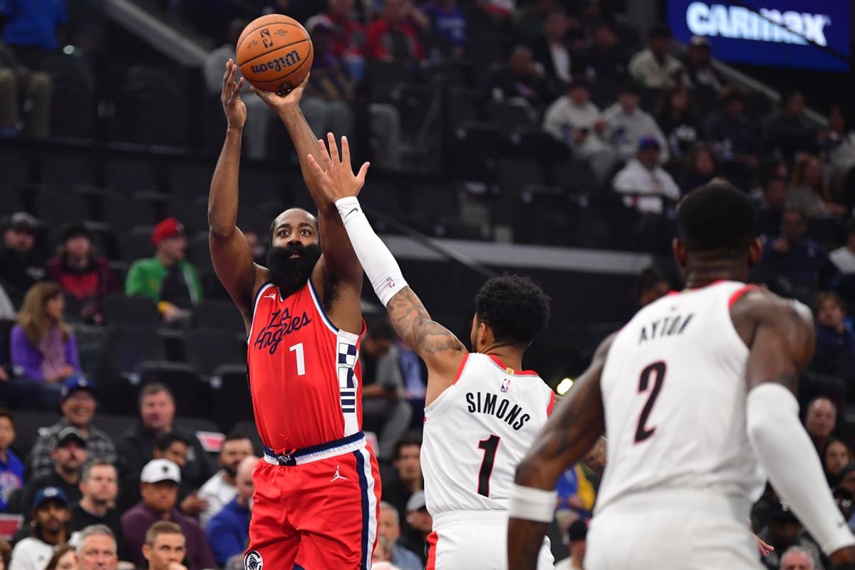 Dec 3, 2024; Inglewood, California, USA;  Los Angeles Clippers guard James Harden (1) shoots against Portland Trail Blazers guard Anfernee Simons (1) during the first half at Intuit Dome. Mandatory Credit: Gary A. Vasquez-Imagn Images