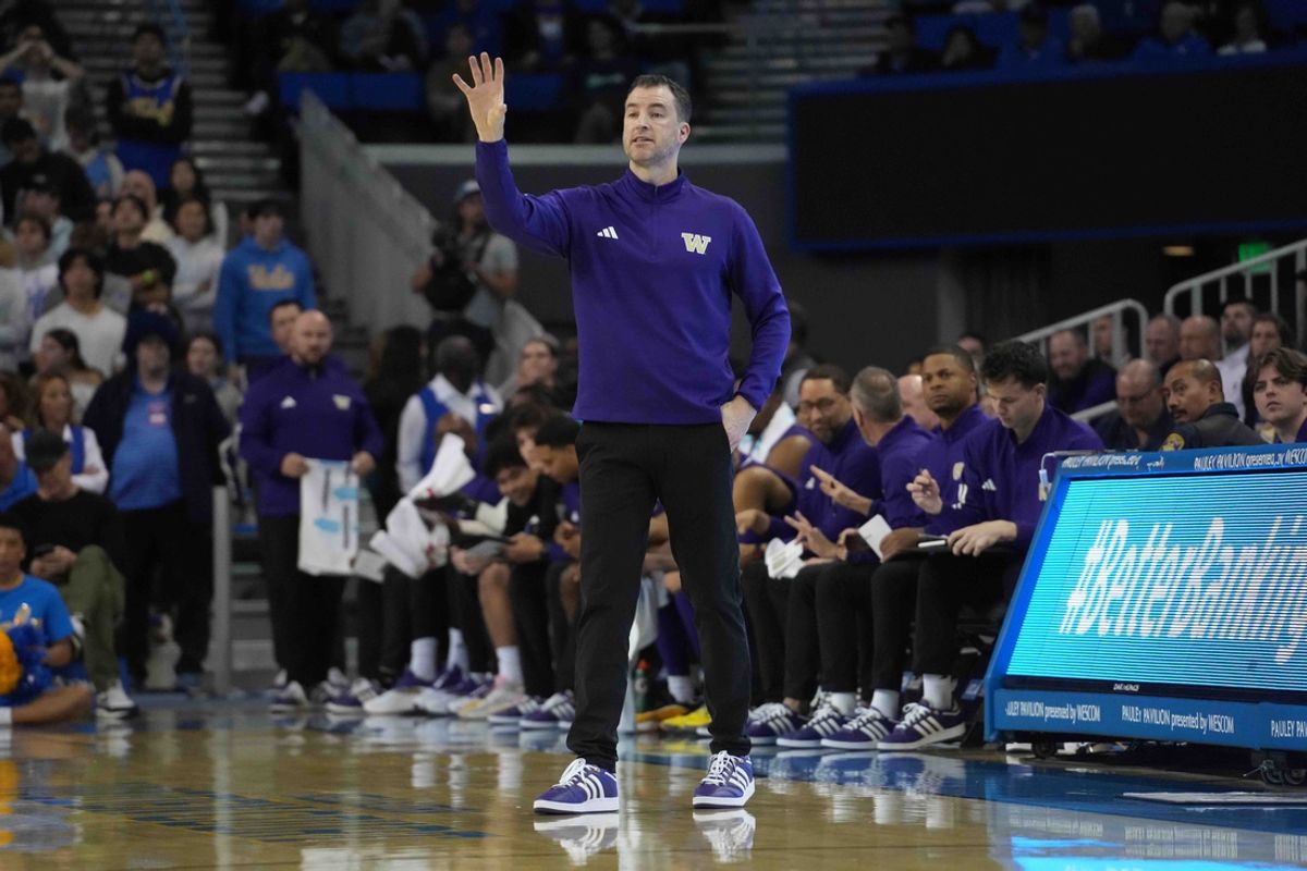 Dec 3, 2024; Los Angeles, California, USA; Washington Huskies head coach Danny Sprinkle gestures in the first half against the UCLA Bruins at Pauley Pavilion presented by Wescom. Mandatory Credit: Kirby Lee-Imagn Images