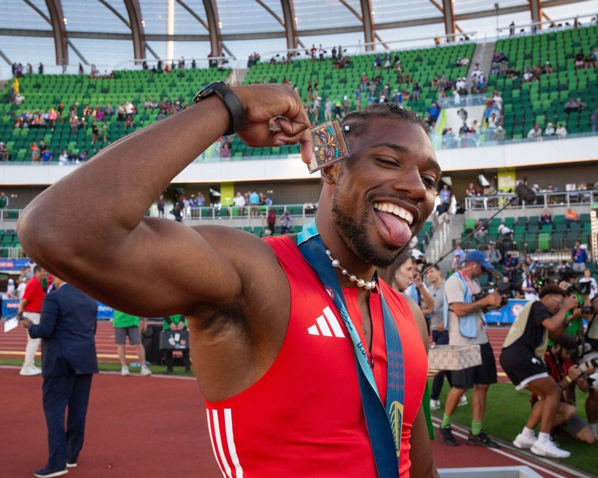Noah Lyles celebrates his gold medal in the men’s 100 meters during day 3 of the U.S. Olympic Trials at Hayward Field in Eugene Sunday, June 23, 2024.