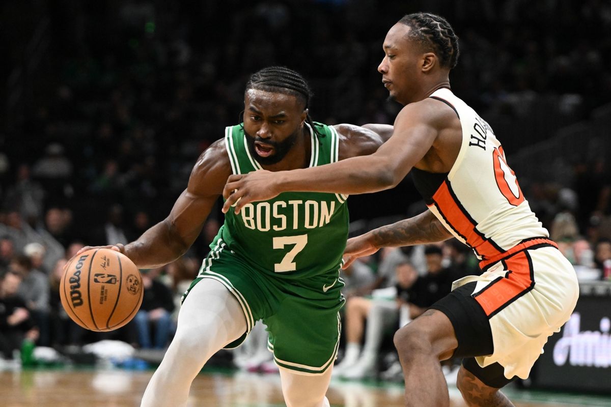 Dec 4, 2024; Boston, Massachusetts, USA; Boston Celtics guard Jaylen Brown (7) drives to the basket against Detroit Pistons forward Ronald Holland II (00) during the third quarter at the TD Garden. Mandatory Credit: Brian Fluharty-Imagn Images