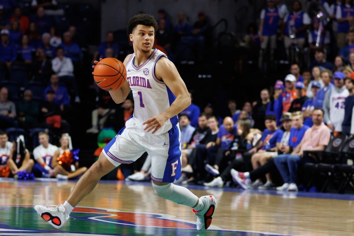 Dec 4, 2024; Gainesville, Florida, USA; Florida Gators guard Walter Clayton Jr. (1) dribbles the ball against the Virginia Cavaliers during the second half at Exactech Arena at the Stephen C. O'Connell Center. Mandatory Credit: Matt Pendleton-Imagn Images