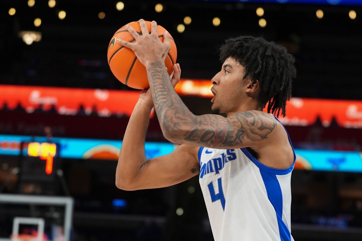 Memphis' PJ Haggerty (4) shoots the ball during the game between Louisiana Tech and University of Memphis at FedExForum in Memphis, Tenn., on Wednesday, December 4, 2024.