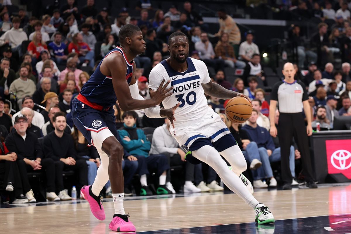 Dec 4, 2024; Inglewood, California, USA;  Minnesota Timberwolves forward Julius Randle (30) drives to the basket against Los Angeles Clippers center Mo Bamba (4) during the first half at Intuit Dome. Mandatory Credit: Kiyoshi Mio-Imagn Images