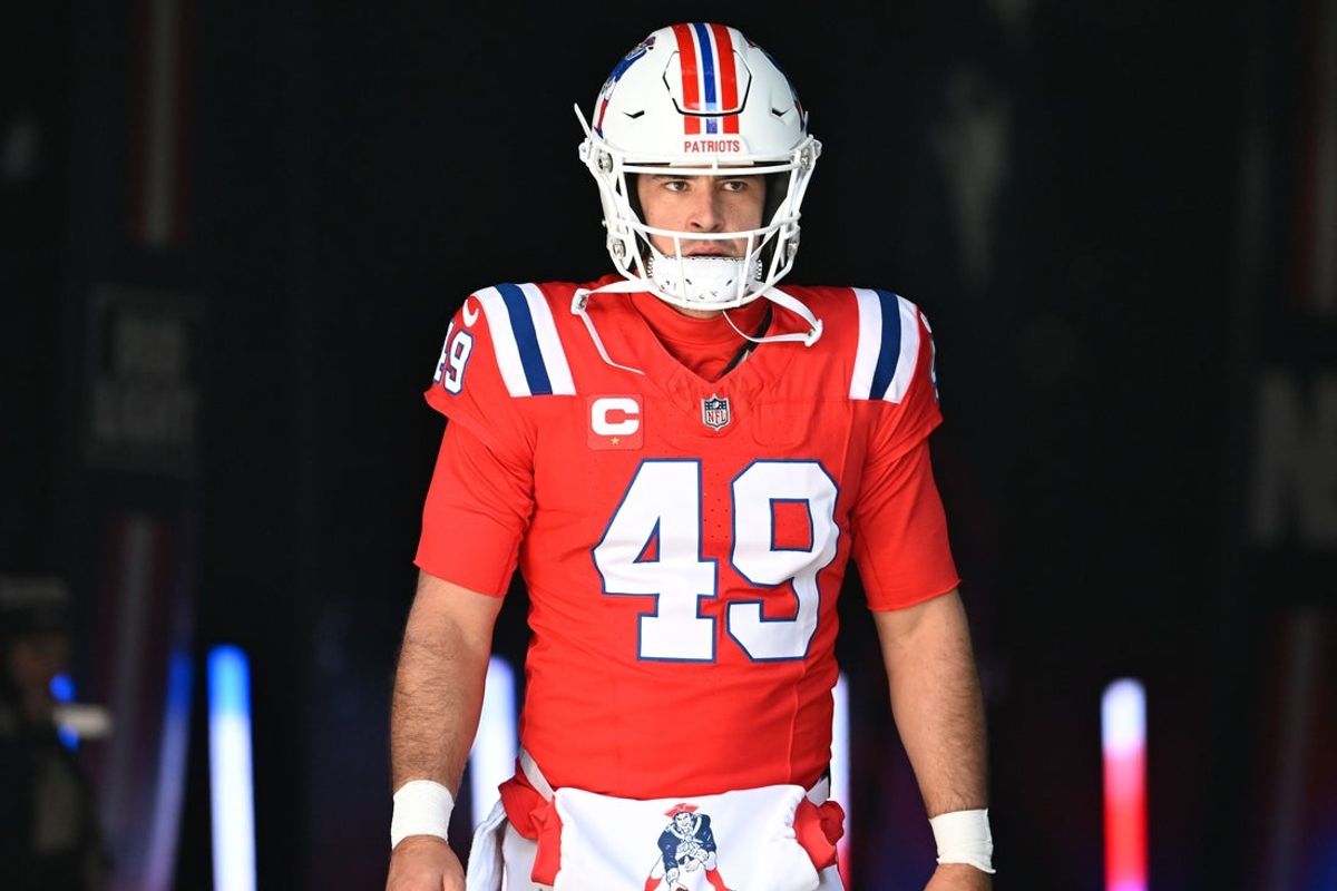 Dec 1, 2024; Foxborough, Massachusetts, USA; New England Patriots long snapper Joe Cardona (49) walks out of the player's tunnel before a game against the Indianapolis Colts at Gillette Stadium. Mandatory Credit: Eric Canha-Imagn Images