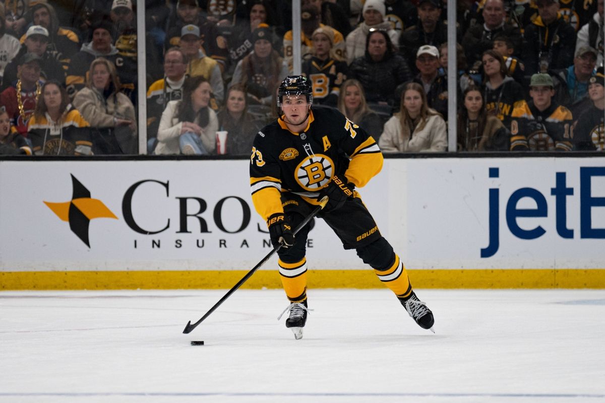 Dec 1, 2024; Boston, Massachusetts, USA; Boston Bruins defenseman Charlie McAvoy (73) skates with the puck in the third period of a game against the Montreal Canadiens at TD Garden. Mandatory Credit: Natalie Reid-Imagn Images