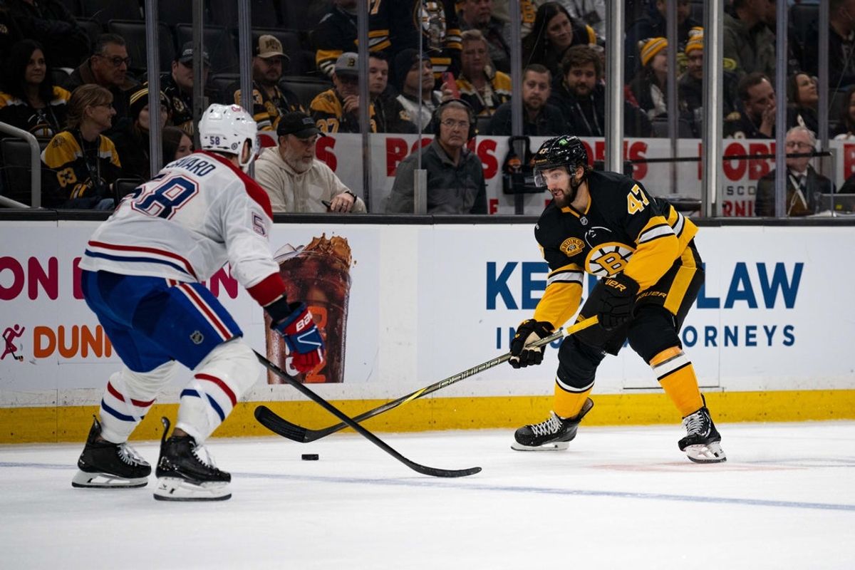 Dec 1, 2024; Boston, Massachusetts, USA; Boston Bruins center Mark Kastelic (47) skates with the puck in the third period of a game against the Montreal Canadiens at TD Garden. Mandatory Credit: Natalie Reid-Imagn Images
