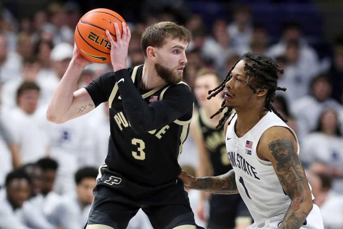 Dec 5, 2024; University Park, Pennsylvania, USA; Purdue Boilermakers guard Braden Smith (3) holds the ball as Penn State Nittany Lions guard Ace Baldwin Jr (1) defends during the first half at Bryce Jordan Center. Mandatory Credit: Matthew O'Haren-Imagn Images