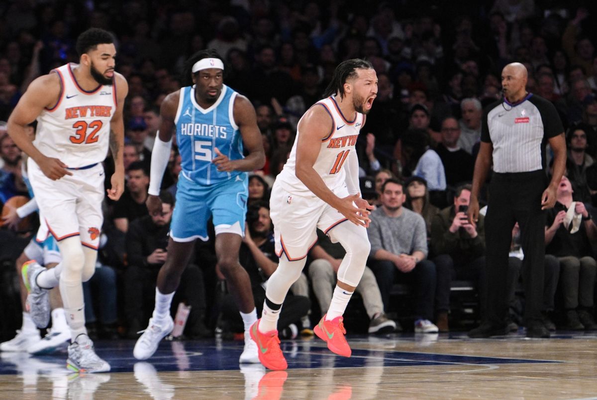 Dec 5, 2024; New York, New York, USA; New York Knicks guard Jalen Brunson (11) reacts during the first half against the Charlotte Hornets at Madison Square Garden. Mandatory Credit: John Jones-Imagn Images