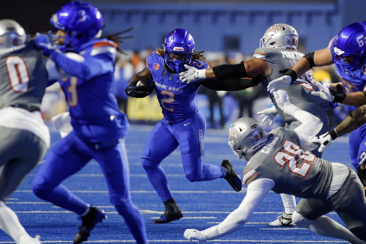 Dec 6, 2024; Boise, ID, USA; Boise State Broncos running back Ashton Jeanty (2) runs for gain during the first quarter against the UNLV Rebels  at Albertsons Stadium. Mandatory Credit: Brian Losness-Imagn Images