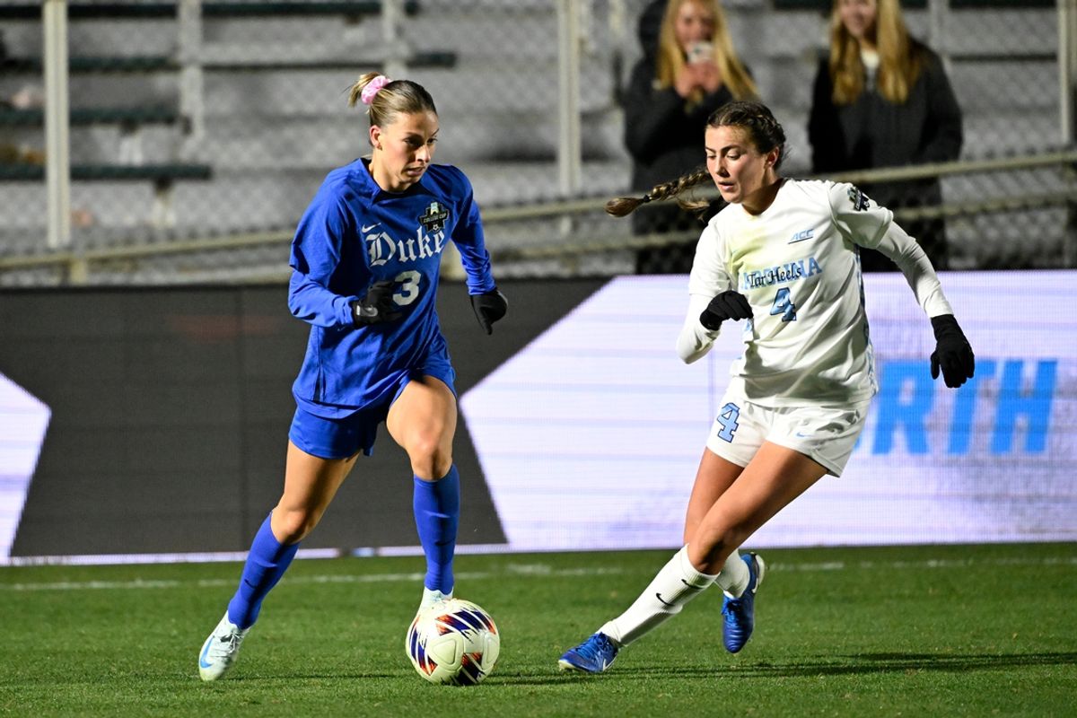 Dec 6, 2024; Cary, NC, USA; Duke forward Ella Hase (3) with the ball as North Carolina defender Trinity Armstrong (3) defends in the second half at WakeMed Soccer Park. Mandatory Credit: Bob Donnan-Imagn Images