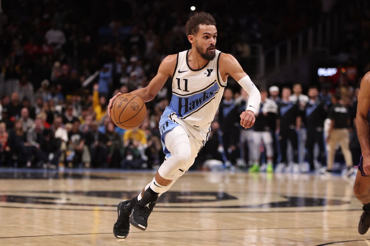 Dec 6, 2024; Atlanta, Georgia, USA; Atlanta Hawks guard Trae Young (11) drives to the basket against the Los Angeles Lakers in the fourth quarter at State Farm Arena. Mandatory Credit: Brett Davis-Imagn Images
