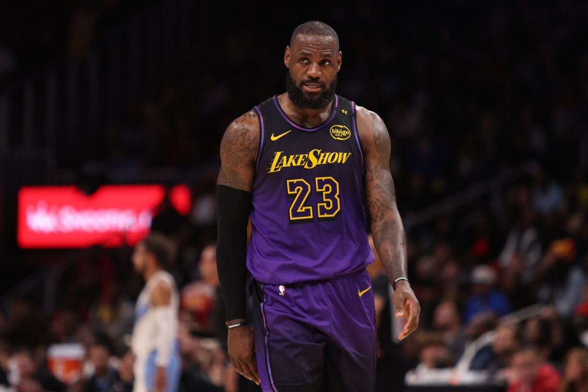 Dec 6, 2024; Atlanta, Georgia, USA; Los Angeles Lakers forward LeBron James (23) in action against the Atlanta Hawks in overtime at State Farm Arena. Mandatory Credit: Brett Davis-Imagn Images