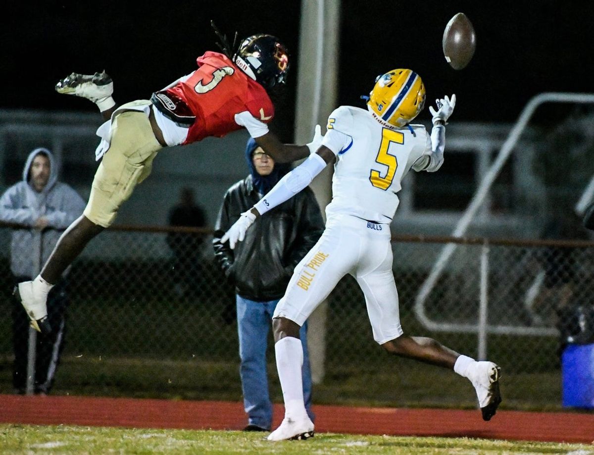 Calvin Russell Jr of Miami Northwestern catches a touchdown pass over Eau Gallie defender Caleb Puzie in the FHSAA football Class 3A state semifinals Friday, December 6, 2024. Craig Bailey/FLORIDA TODAY via USA TODAY NETWORK