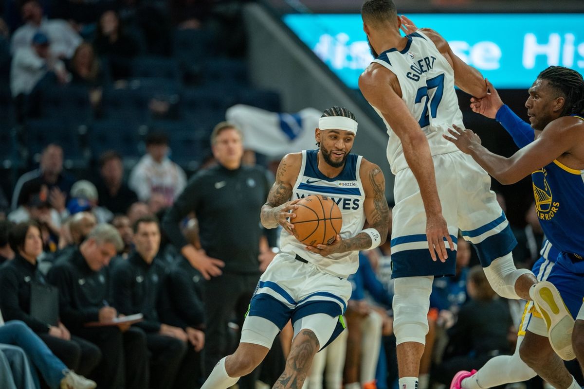 Dec 6, 2024; San Francisco, California, USA; Minnesota Timberwolves guard Nickeil Alexander-Walker (9) uses the block provide by center Rudy Gobert (27) against Golden State Warriors forward Kevon Looney (5) during the third quarter at Chase Center. Mandatory Credit: Neville E. Guard-Imagn Images