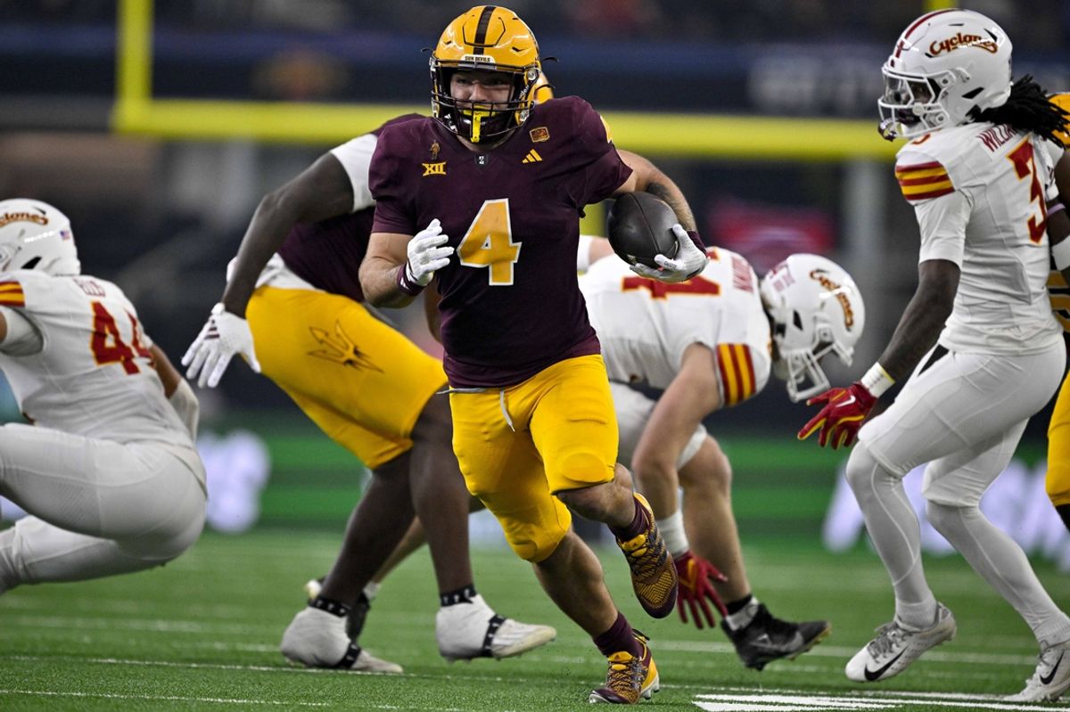 Dec 7, 2024; Arlington, TX, USA; Arizona State Sun Devils running back Cam Skattebo (4) scores a rushing touchdown against the Iowa State Cyclones during the second half at AT&T Stadium. Mandatory Credit: Jerome Miron-Imagn Images
