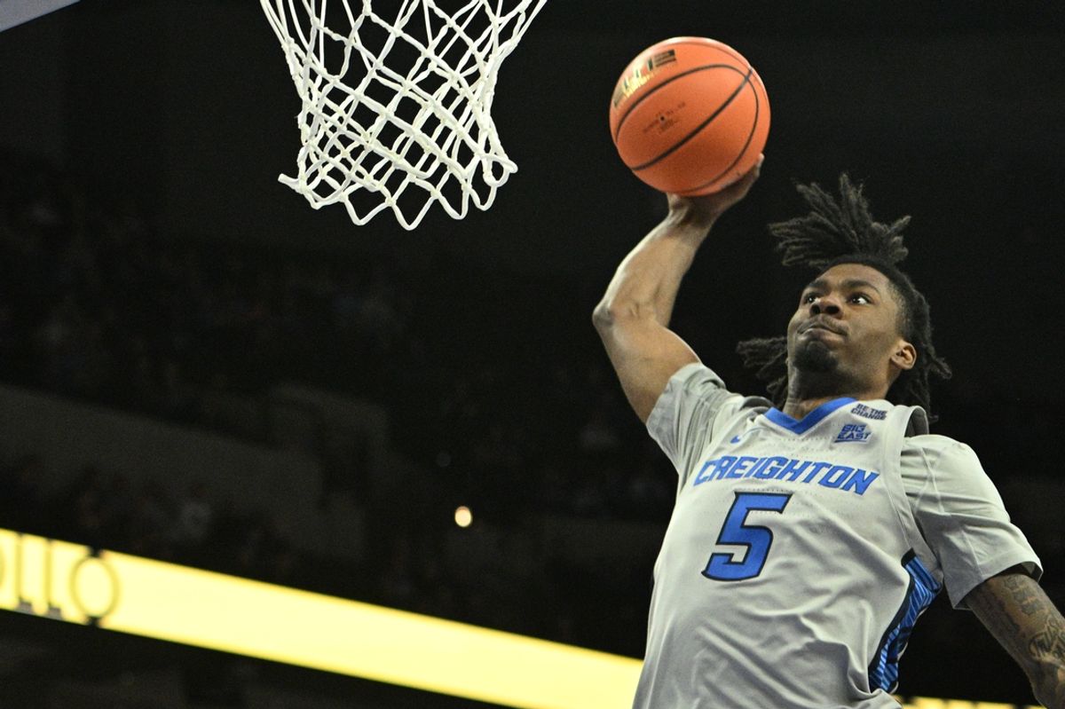 Dec 7, 2024; Omaha, Nebraska, USA;  Creighton Bluejays guard Jamiya Neal (5) dunks against the UNLV Rebels in the second half at CHI Health Center Omaha. Mandatory Credit: Steven Branscombe-Imagn Images