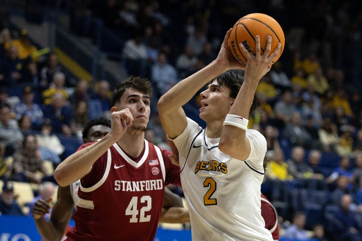 Dec 7, 2024; Berkeley, California, USA; California Golden Bears guard Andrej Stojakovic (2) drives to the basket against Stanford Cardinal forward Maxime Raynaud (42) during the first half at Haas Pavilion. Mandatory Credit: D. Ross Cameron-Imagn Images