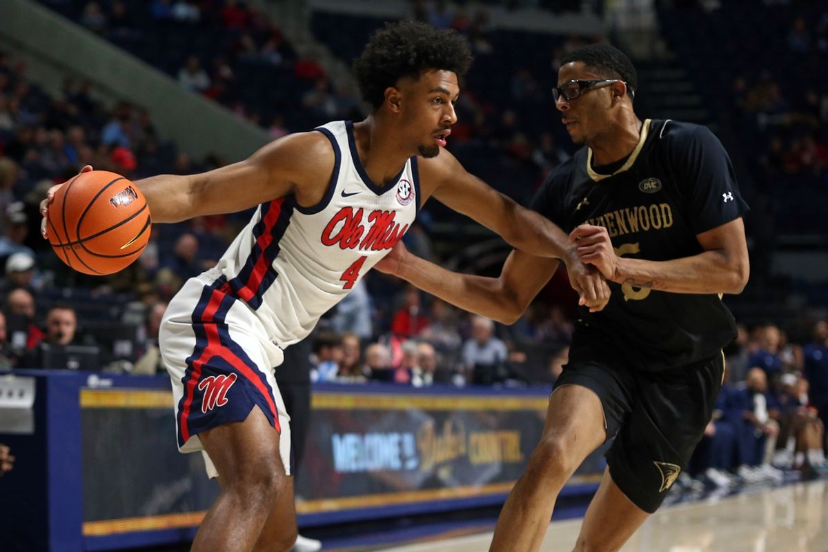 Dec 7, 2024; Oxford, Mississippi, USA; Mississippi Rebels forward Jaemyn Brakefield (4) drives to the basket against Lindenwood Lions forward Jaylon McDaniel (5) during the first half at The Sandy and John Black Pavilion at Ole Miss. Mandatory Credit: Petre Thomas-Imagn Images