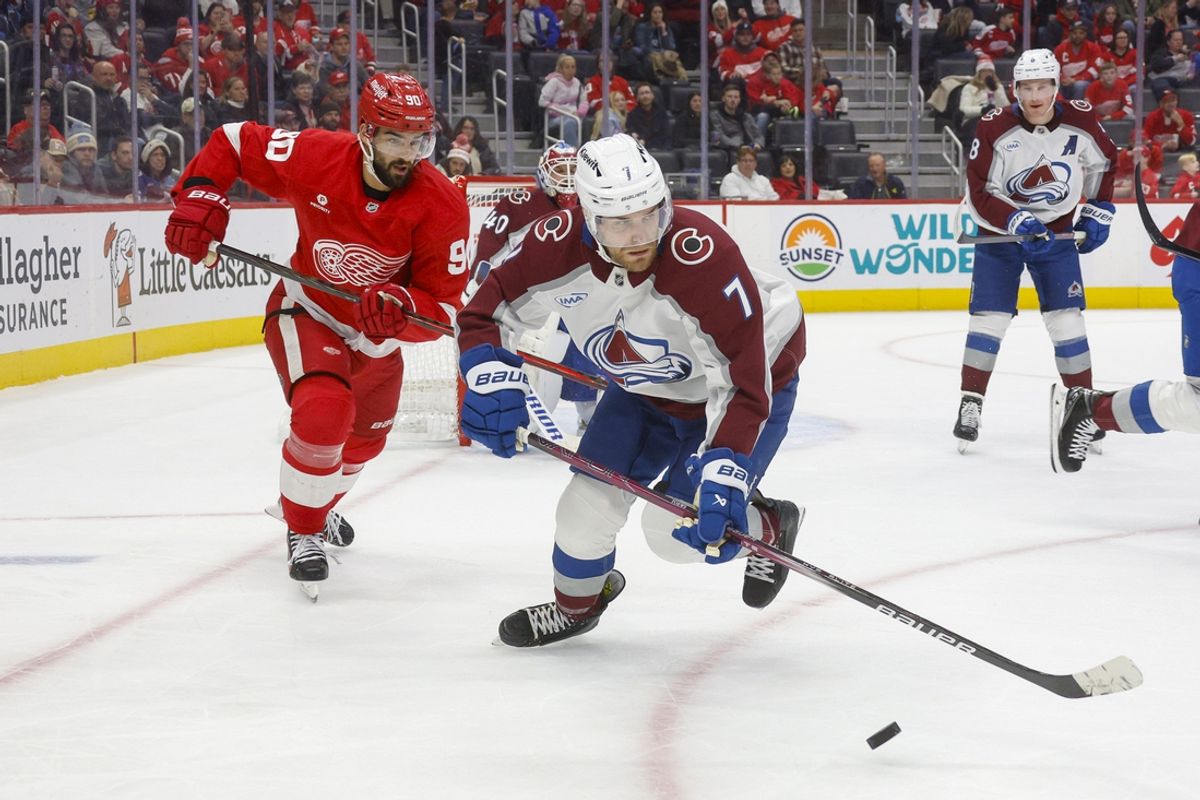 Dec 7, 2024; Detroit, Michigan, USA; Colorado Avalanche defenseman Devon Toews (7) handles the puck against the Detroit Red Wings during the second period at Little Caesars Arena. Mandatory Credit: Brian Bradshaw Sevald-Imagn Images