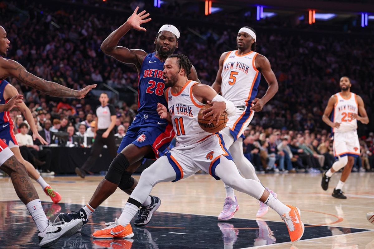 Dec 7, 2024; New York, New York, USA; New York Knicks guard Jalen Brunson (11) drives to the basket as Detroit Pistons center Isaiah Stewart (28) defends during the second half at Madison Square Garden. Mandatory Credit: Vincent Carchietta-Imagn Images