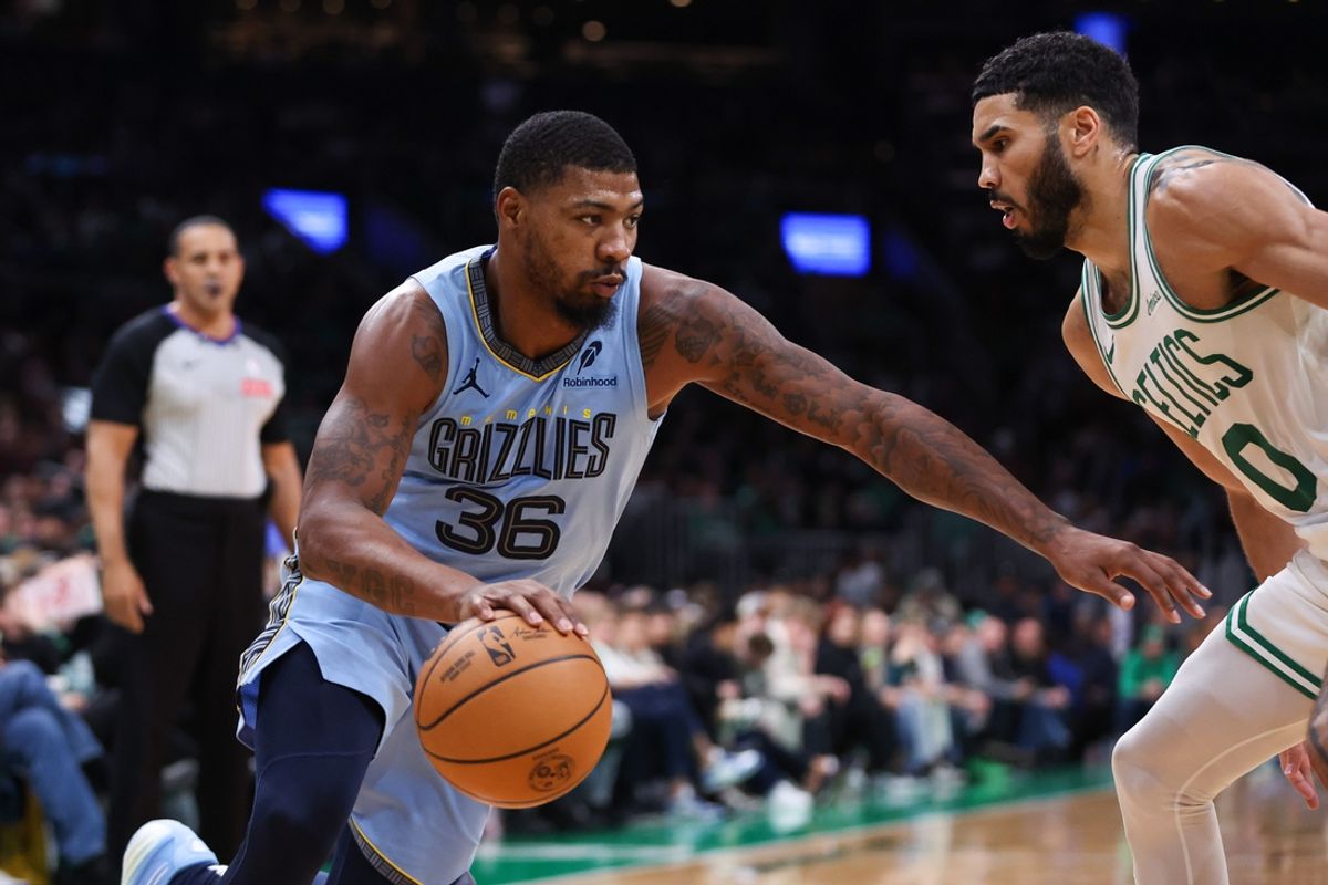 Dec 7, 2024; Boston, Massachusetts, USA; Memphis Grizzlies guard Marcus Smart (36) drives to the basket during the second half against the Boston Celtics at TD Garden. Mandatory Credit: Paul Rutherford-Imagn Images