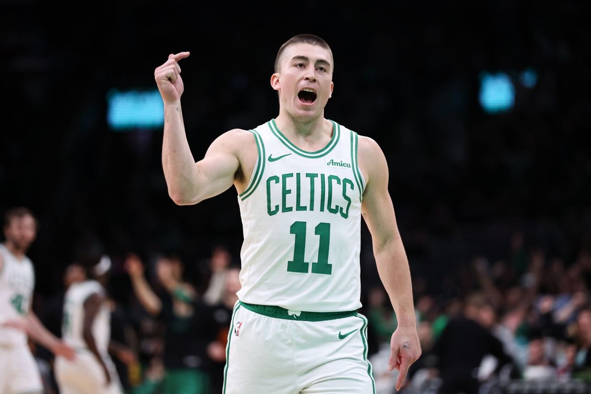 Dec 7, 2024; Boston, Massachusetts, USA; Boston Celtics guard Payton Pritchard (11) reacts during the second half against the Memphis Grizzlies at TD Garden. Mandatory Credit: Paul Rutherford-Imagn Images