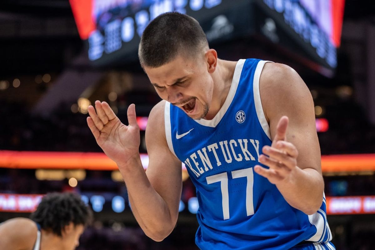 Dec 7, 2024; Seattle, Washington, USA;  Kentucky Wildcats guard Kerr Kriisa (77) reacts during the first half against the Gonzaga Bulldogs at Climate Pledge Arena. Mandatory Credit: Stephen Brashear-Imagn Images