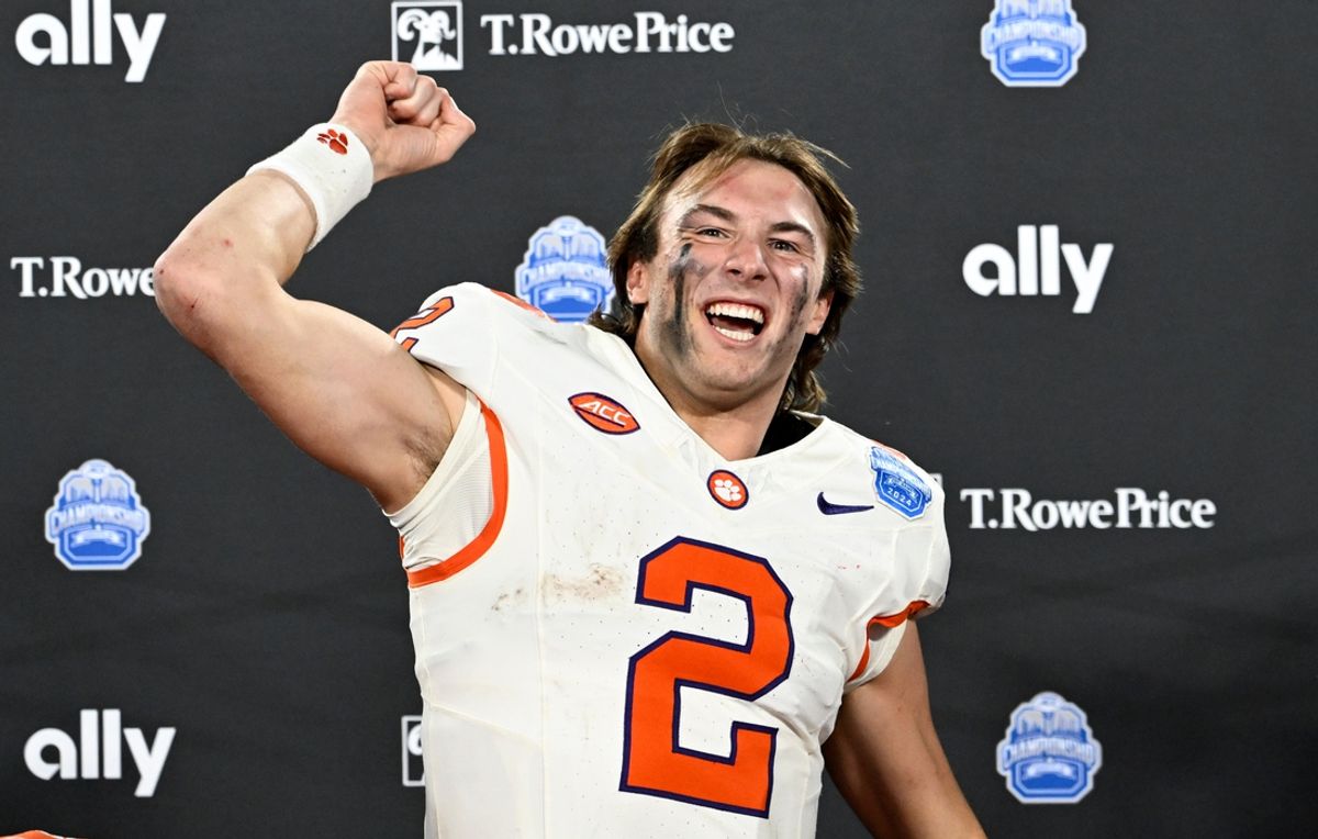 Dec 7, 2024; Charlotte, NC, USA; Clemson Tigers quarterback Cade Klubnik (2) celebrates after winning the 2024 ACC Championship game against the Southern Methodist Mustangs at Bank of America Stadium. Mandatory Credit: Bob Donnan-Imagn Images