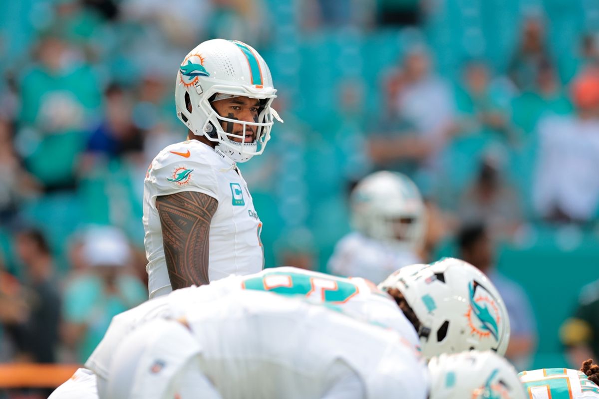 Dec 8, 2024; Miami Gardens, Florida, USA; Miami Dolphins quarterback Tua Tagovailoa (1) looks on from the line of scrimmage before the game against the New York Jets at Hard Rock Stadium. Mandatory Credit: Sam Navarro-Imagn Images