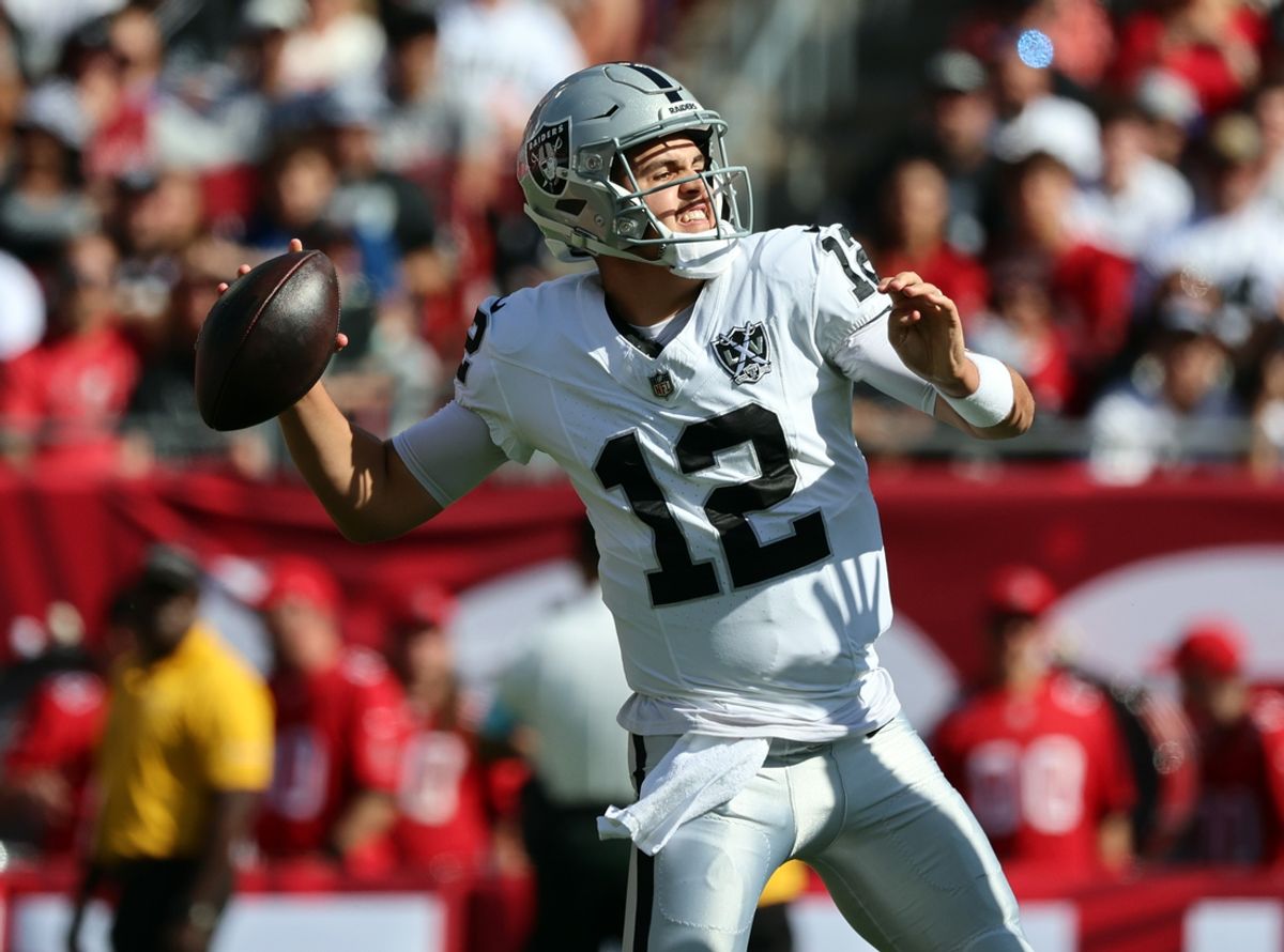 Dec 8, 2024; Tampa, Florida, USA; Las Vegas Raiders quarterback Aidan O'Connell (12) throws the ball during the first half against the Tampa Bay Buccaneers at Raymond James Stadium. Mandatory Credit: Kim Klement Neitzel-Imagn Images