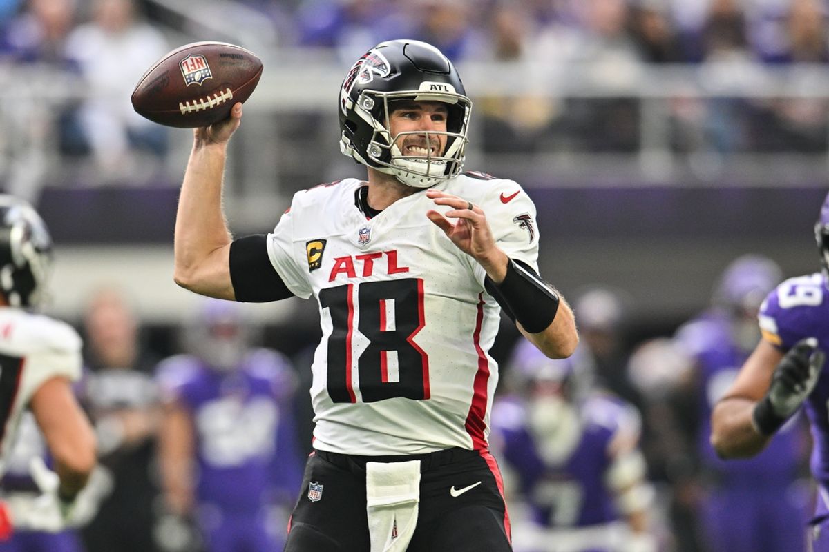 Dec 8, 2024; Minneapolis, Minnesota, USA; Atlanta Falcons quarterback Kirk Cousins (18) throws a pass against the Minnesota Vikings during the second quarter at U.S. Bank Stadium. Mandatory Credit: Jeffrey Becker-Imagn Images