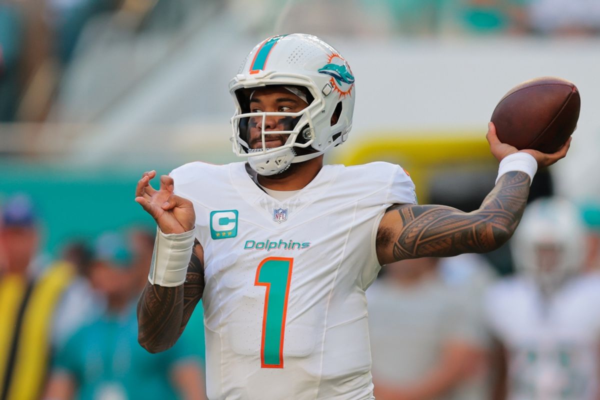 Dec 8, 2024; Miami Gardens, Florida, USA; Miami Dolphins quarterback Tua Tagovailoa (1) throws the football against the New York Jets during the third quarter at Hard Rock Stadium. Mandatory Credit: Sam Navarro-Imagn Images