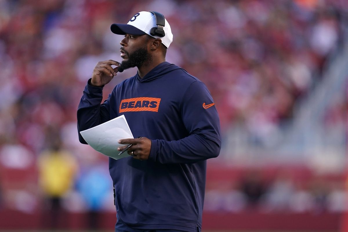 Dec 8, 2024; Santa Clara, California, USA; Chicago Bears interim head coach Thomas Brown stands on the field after calling a timeout against the San Francisco 49ers in the fourth quarter at Levi's Stadium. Mandatory Credit: Cary Edmondson-Imagn Images