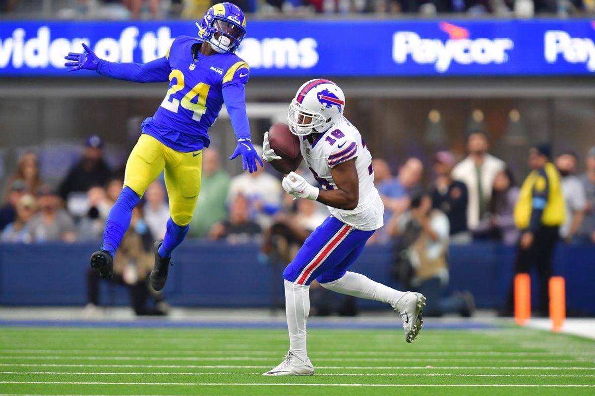 Dec 8, 2024; Inglewood, California, USA; Buffalo Bills wide receiver Amari Cooper (18) catches a pass against Los Angeles Rams cornerback Darious Williams (24) during the second half at SoFi Stadium. Mandatory Credit: Gary A. Vasquez-Imagn Images